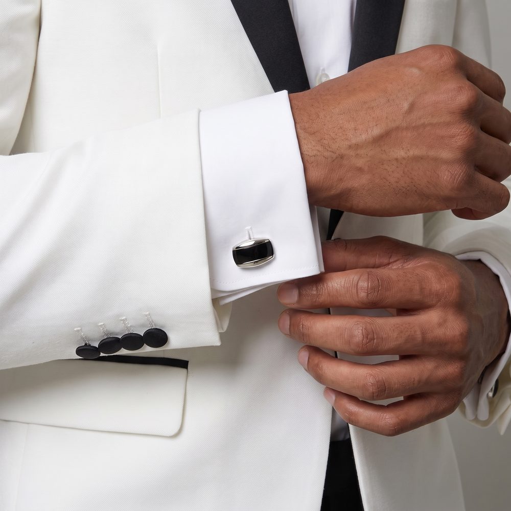 Cufflink and cuff detail on the ivory dinner jacket